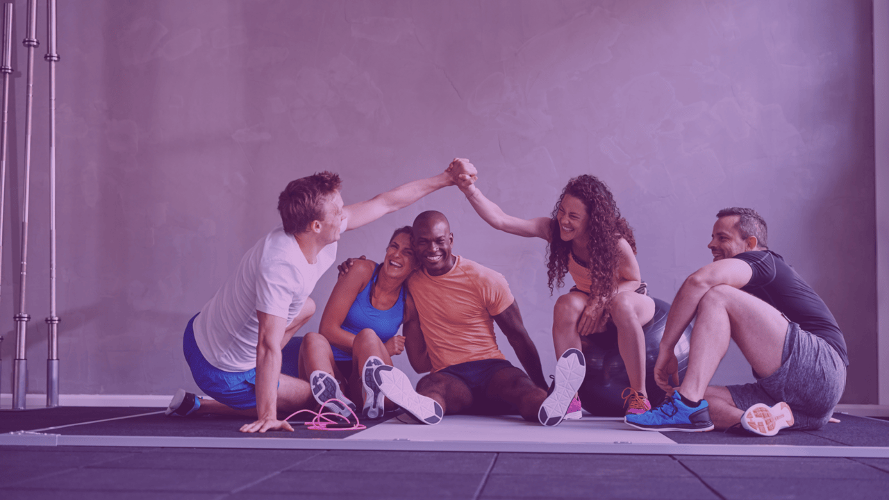 Happy people at the gym